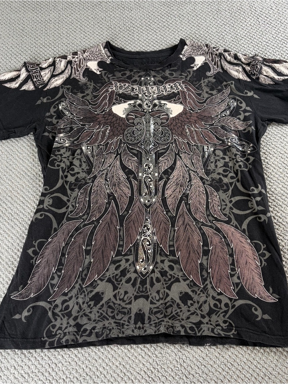 Black Short Sleeve Graphic Tee with Feathered Cross Design